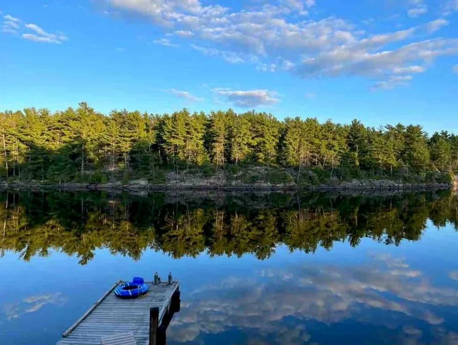 Calm waters of Badger Lake at Hartley Bay Cottages